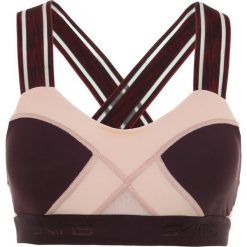 Biustonosze sportowe: Skins DNAMIC CROP Biustonosz sportowy merlot