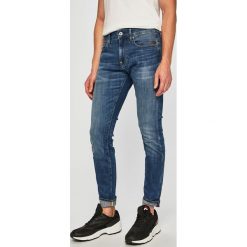 G-Star Raw - Jeansy. Niebieskie jeansy męskie G-Star RAW, z aplikacjami, retro. Za 469,90 zł.