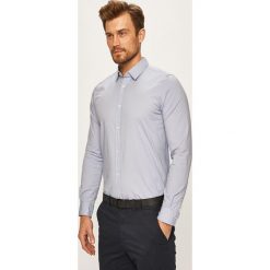 Tom Tailor Denim - Koszula. Białe koszule męskie TOM TAILOR DENIM, s, bez wzorów, z elastanu, klasyczne, z klasycznym kołnierzykiem, z długim rękawem. W wyprzedaży za 119,90 zł.