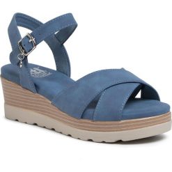 Sandały XTI - 34229 Jeans. Niebieskie klapki damskie Xti, bez wzorów, z jeansu, bez obcasa, na obcasie. W wyprzedaży za 189,00 zł.