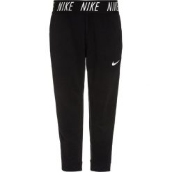 Nike Performance DRY CORE STUDIO Spodnie treningowe black/white. Czarne spodnie chłopięce marki Nike Performance, z materiału. W wyprzedaży za 151,05 zł.