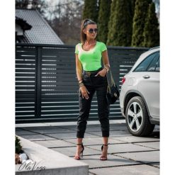 Spodnie ,,BOJÓWKI VANESS" czarne. Czarne spodnie damskie Divinostyle, s, bez wzorów, z elastanu. Za 169,00 zł.