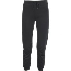 Filippa K SHINY TRACK PANTS Spodnie treningowe black. Czarne spodnie damskie marki Filippa K, l, z bawełny. Za 509,00 zł.