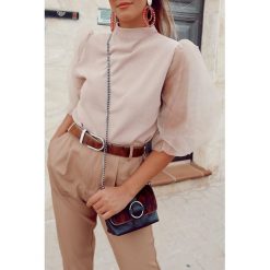 Bluzka damska RIVENA BEIGE. Brązowe bluzki damskie Bluzka damska RIVENA BEIGE, s, bez wzorów, bez kołnierzyka, bez rękawów. W wyprzedaży za 69,00 zł.