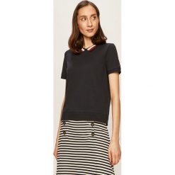 Tommy Hilfiger - T-shirt. Białe bluzki damskie TOMMY HILFIGER, s, z aplikacjami, z elastanu, bez kołnierzyka. Za 399,90 zł.