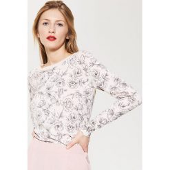 Swetry klasyczne damskie: Sweter w kwiaty – Różowy