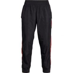 Bryczesy damskie: adidas by Stella McCartney TRAIN Spodnie treningowe dark grey