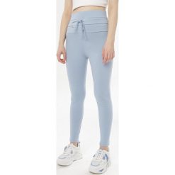 Jasnoniebieskie Legginsy Mariris. Niebieskie legginsy damskie Born2be, s, bez wzorów. W wyprzedaży za 59,99 zł.