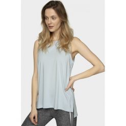 Top treningowy damski TSDF603 - jasny niebieski - Outhorn. Niebieskie koszulki damskie termoaktywne Outhorn, bez wzorów, bez kołnierzyka, bez rękawów. Za 49,99 zł.