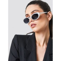 NA-KD Accessories Owalne okulary przeciwsłoneczne retro - White. Białe okulary przeciwsłoneczne damskie marki NA-KD Accessories, retro, owalne. W wyprzedaży za 32,38 zł.
