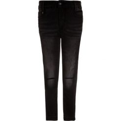 Tumble 'n dry ESTELLE Jeans Skinny Fit denim. Czarne jeansy dziewczęce marki Tumble 'n dry, z bawełny. W wyprzedaży za 167,20 zł.