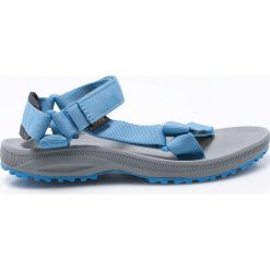 Teva - Sandały. Niebieskie klapki damskie Teva, bez wzorów, z materiału, bez obcasa, na obcasie. W wyprzedaży za 139,90 zł.