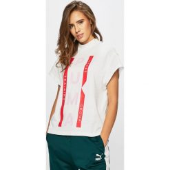Puma - Top Xtg Graphic. Białe topy damskie marki Puma, s, z nadrukiem, z elastanu. Za 159,90 zł.