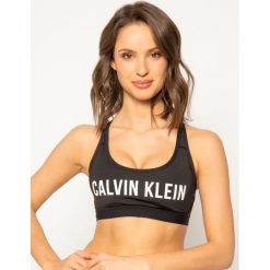 Biustonosz top Calvin Klein Performance Low Impact Sports 00GWS0K137. Czarne topy damskie Calvin Klein Performance, s, bez wzorów, z elastanu, bez kołnierzyka. W wyprzedaży za 159,00 zł.