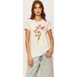 Levi's - T-shirt. Białe bluzki damskie Levi's®, s, z nadrukiem, z bawełny, z okrągłym kołnierzem. Za 129,90 zł.