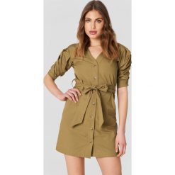 Trendyol Sukienka z bufkami - Beige. Brązowe sukienki damskie Trendyol, bez wzorów, bez kołnierzyka, bez rękawów. W wyprzedaży za 80,97 zł.