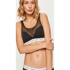Guess Jeans - Biustonosz. Czarne biustonosze sportowe damskie Guess Jeans, s, z aplikacjami, z elastanu. Za 139,90 zł.