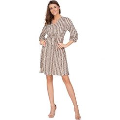 Sukienka boho rozkloszowana taliowana - zielony, 38. Zielone sukienki damskie e-margeritka.pl, bez wzorów, z elastanu, eleganckie, bez rękawów, bez kaptura. Za 159,99 zł.