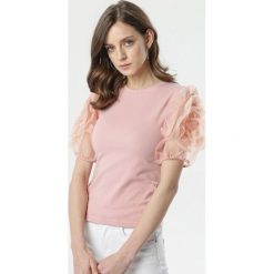 Różowa Bluzka Neaira. Różowe bluzki damskie Born2be, s, bez wzorów, bez kołnierzyka, bez rękawów. W wyprzedaży za 59,99 zł.