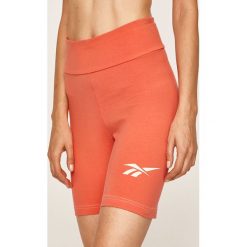 Reebok Classic - Szorty. Pomarańczowe szorty damskie Reebok Classic, s, bez wzorów, z elastanu, casualowe. W wyprzedaży za 89,90 zł.