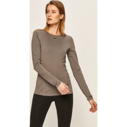 Nike - Longsleeve. Szare topy damskie Nike, s, bez wzorów, z elastanu, z długim rękawem, dri-fit (nike). Za 149,90 zł.