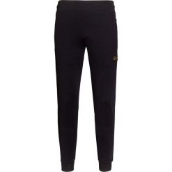 Spodnie EA7 EMPORIO ARMANI. Czarne spodnie męskie EA7 Emporio Armani, na co dzień, bez wzorów, z dresówki. W wyprzedaży za 441,00 zł.