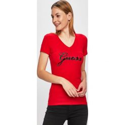 Guess Jeans - Top. Szare bluzki damskie Guess Jeans, s, z nadrukiem, z bawełny, z okrągłym kołnierzem, z krótkim rękawem. W wyprzedaży za 99,90 zł.