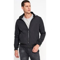 Czarna Dwustronna Kurtka Pasilea. Czarne kurtki męskie Born2be, xl, bez wzorów. Za 149,99 zł.