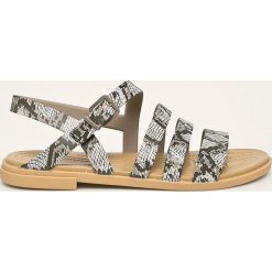 Crocs - Sandały. Żółte klapki damskie Crocs, bez wzorów, z gumy, bez obcasa, na obcasie. W wyprzedaży za 179,90 zł.