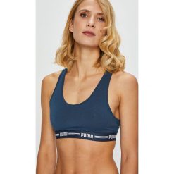 Puma - Biustonosz. Czarne biustonosze sportowe damskie Puma, xs, bez wzorów, z elastanu. W wyprzedaży za 59,90 zł.
