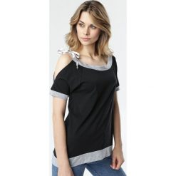 Czarna Bluzka Zhaviane. Czarne bluzki damskie Born2be, xl, bez wzorów, bez kołnierzyka, bez rękawów. W wyprzedaży za 54,99 zł.