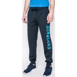 Tommy Hilfiger - Spodnie piżamowe. Niebieskie piżamy męskie marki TOMMY HILFIGER, xl, z nadrukiem, z elastanu. W wyprzedaży za 179,90 zł.