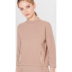 Bluza z ozdobnymi zamkami - Beżowy. Brązowe bluzy damskie Mohito, s, bez wzorów, bez rękawów, bez kaptura. Za 89,99 zł.