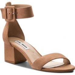 Sandały STEVE MADDEN - Indigo Mid Heel Sandal 91001022-10002-13004 Tan. Pomarańczowe klapki damskie marki Steve Madden, bez wzorów, ze skóry ekologicznej, bez obcasa, na obcasie. W wyprzedaży za 289,00 zł.
