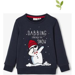 Bluza "Cool" w kolorze granatowym. Niebieskie bluzy niemowlęce name it boys, z nadrukiem, z bawełny, bez rękawów, bez kaptura. W wyprzedaży za 52,95 zł.