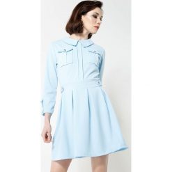 Niebieska Sukienka Prepensely. Niebieskie sukienki damskie other, bez wzorów, bez kołnierzyka, bez rękawów, mini. Za 79,99 zł.