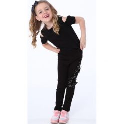 Legginsy z motylkami czarne NDZ8689. Czarne legginsy dziewczęce marki Fasardi. Za 49,00 zł.