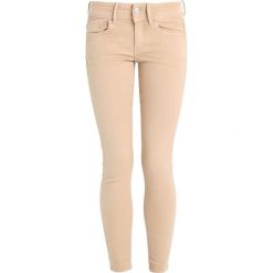 GStar LYNN DMID SUPER SKINNY ANKLE COJ Jeans Skinny Fit calico. Brązowe jeansy damskie marki G-Star, z elastanu. W wyprzedaży za 421,85 zł.