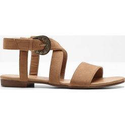 Sandały bonprix koniakowy. Pomarańczowe sandały damskie bonprix, w paski, bez obcasa, z paskami. Za 30,99 zł.