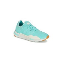 Buty Le Coq Sportif SOLAS W SUMMER FLAVOR. Niebieskie trampki i tenisówki damskie le coq sportif, bez wzorów, bez zapięcia. Za 174,50 zł.