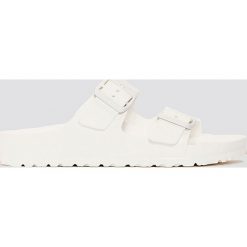 Birkenstock Klapki Arizona Eva - White. Białe klapki damskie marki Birkenstock, bez wzorów, bez obcasa. Za 181,95 zł.