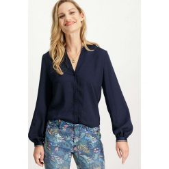 Bluzka w kolorze granatowym. Niebieskie bluzki damskie Garcia, xs, bez wzorów, z okrągłym kołnierzem, bez rękawów. W wyprzedaży za 79,95 zł.