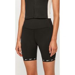 Reebok - Szorty. Czarne spodenki sportowe damskie Reebok, s, z aplikacjami, z elastanu, sportowe, z podwyższonym stanem. Za 139,90 zł.