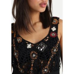 Free People LAST ROSE TANK Top black combo. Czarne koszulki damskie marki Free People, bez wzorów, z bawełny, bez kołnierzyka. Za 709,00 zł.