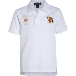 Polo Ralph Lauren NOVEL Koszulka polo white. Białe t-shirty chłopięce Polo Ralph Lauren, z bawełny. W wyprzedaży za 152,55 zł.