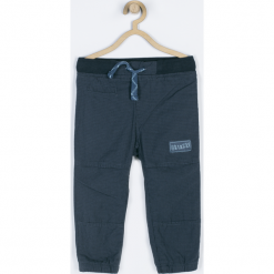 Spodnie. Niebieskie spodnie chłopięce marki GRIZZLY BEAR, z bawełny. Za 54,90 zł.