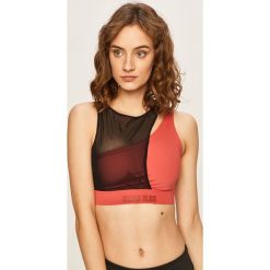 Calvin Klein Performance - Biustonosz sportowy. Różowe biustonosze sportowe damskie Calvin Klein Performance, s, z nadrukiem, z elastanu. Za 269,90 zł.
