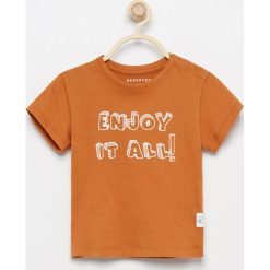 KOSZULKA CHŁOPIĘCA - Brązowy. Pomarańczowe t-shirty chłopięce Reserved, bez wzorów, bez rękawów. Za 14,99 zł.