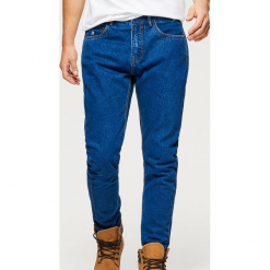 Jeansy COMFORT CARROT - Granatowy. Niebieskie jeansy męskie regular Cropp. Za 99,99 zł.
