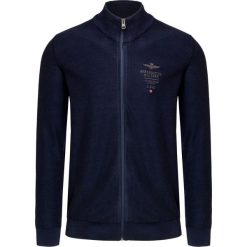 Sweter AERONAUTICA MILITARE. Niebieskie swetry męskie Aeronautica Militare, z haftami, z dzianiny, ze stójką, bez kaptura. Za 570,00 zł.